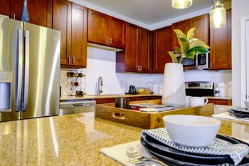 Granite countertops and tiled backsplash